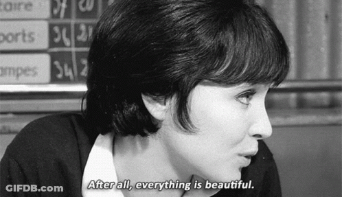 A Black And White Photo Of A Woman With The Words After All Everything Is Beautiful GIF