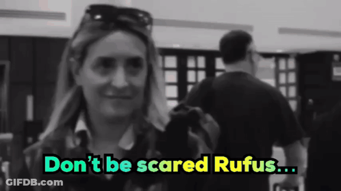 A Black And White Photo Of A Woman With The Words " Don 'T Be Scared Rufus " Above Her GIF