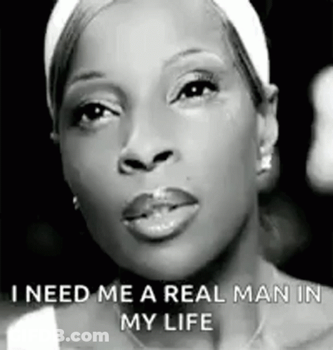 A Black And White Photo Of A Woman With The Words `` I Need Me A Real Man In My Life '' Written On Her Face . GIF