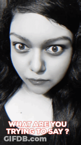 A Black And White Photo Of A Woman With The Words " What Are You Trying To Say " Above Her GIF