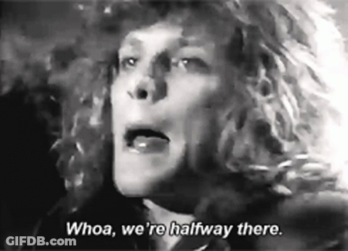 A Black And White Photo Of A Woman With The Words `` Whoa , We 'Re Halfway There '' . GIF