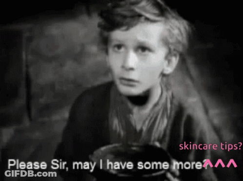 A Black And White Photo Of A Young Boy Asking For Skincare Tips GIF