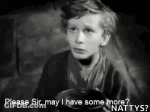 A Black And White Photo Of A Young Boy Holding A Bowl And Asking For Some More . GIF