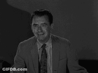A Black And White Photo Of A Young Boy GIF