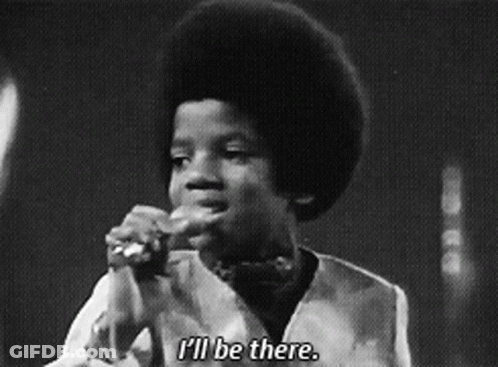A Black And White Photo Of A Young Boy Singing Into A Microphone And Saying I 'Ll Be There GIF