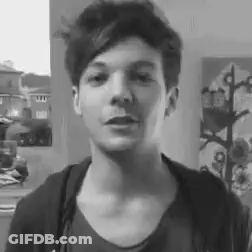 Black And White Photo Of Young Man In Hoodie GIF