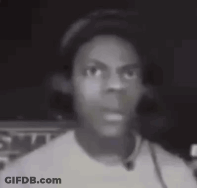 A Black And White Photo Of A Young Man Wearing Headphones And A Hat . GIF