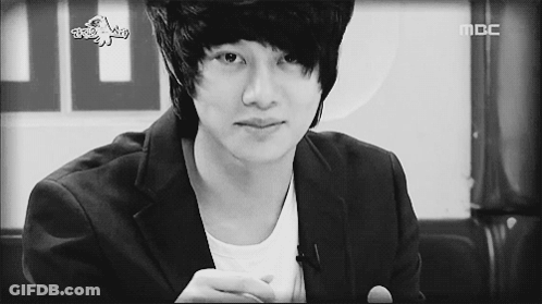 A Black And White Photo Of A Young Man With The Word Mbc On The Bottom GIF