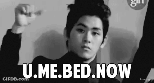 A Black And White Photo Of A Young Man With The Words " U.me.bed.now " Above Him GIF