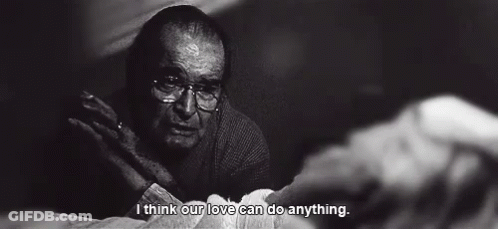 A Black And White Photo Of An Elderly Man With Glasses And The Words I Think Our Love Can Do Anything GIF