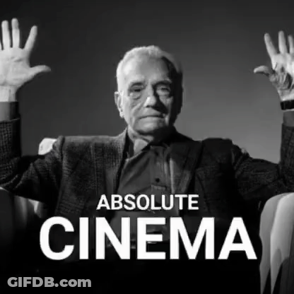A Black And White Photo Of An Elderly Man With His Hands In The Air And The Words Absolute Cinema Below Him GIF