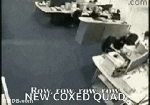 A Black And White Photo Of An Office With The Words `` Row Row Row New Coxed Quad '' GIF