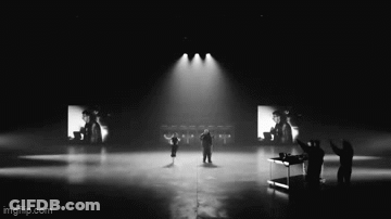 A Black And White Photo Of People On A Stage With Imgflip.com Written On The Bottom GIF