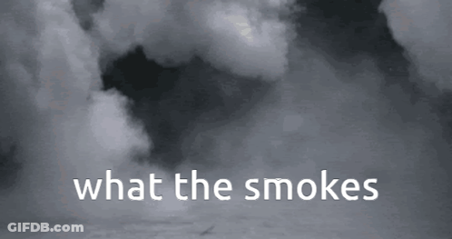 A Black And White Photo Of Smoke With The Words What The Smoke Says GIF