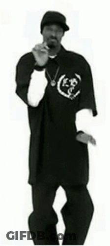A Black And White Photo Of Snoop Dogg Dancing . GIF