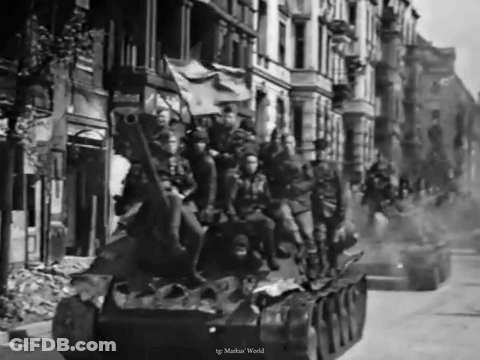 Black And White Soldiers On Tank GIF