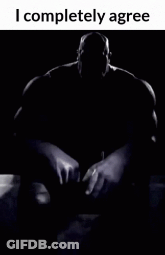 A Black And White Photo Of Thanos With The Words I Completely Agree GIF