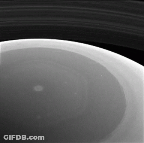 A Black And White Photo Of The Inside Of A Planet GIF