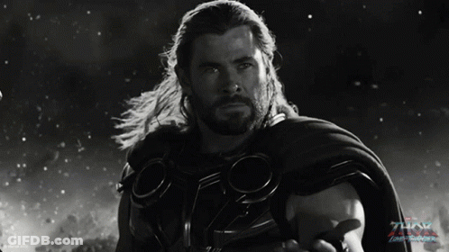 A Black And White Photo Of Thor With The Word Thor On The Bottom Right GIF