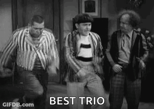 A Black And White Photo Of Three Men Dancing In A Living Room . GIF