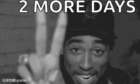 A Black And White Photo Of Tupac Shakur Making A Peace Sign . GIF