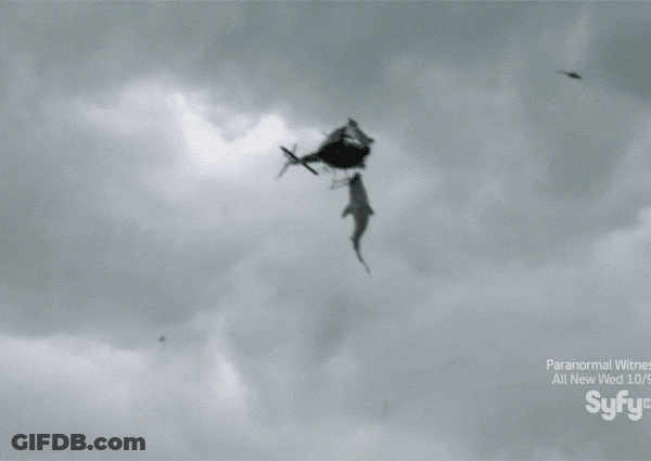 A Black And White Photo Of Two Helicopters In The Sky With Syfy Written On The Bottom Right GIF