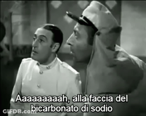 A Black And White Photo Of Two Men With A Caption That Says Aaa GIF