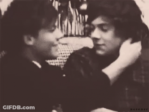 A Black And White Photo Of Two Men With The Word Nectar On The Bottom Right Corner GIF