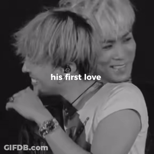 A Black And White Photo Of Two Men With The Words His First Love Written On The Bottom GIF
