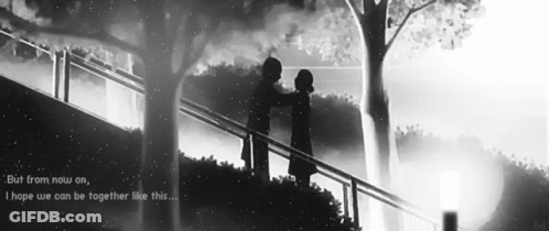 Black And White Photo Of Two On Bridge GIF