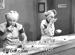A Black And White Photo Of Two Women In Chef 'S Hats Standing Next To Each Other In A Kitchen . GIF
