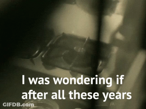 A Black And White Photo With The Words " I Was Wondering If After All These Years " Below It GIF