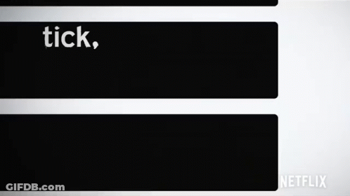A Black And White Sign That Says Tick Tick Boom On It GIF