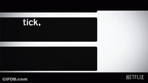 A Black And White Sign That Says Tick Tick Boom On It GIF