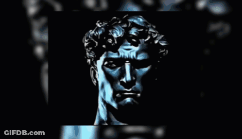 A Black And White Statue Of A Man 'S Face GIF