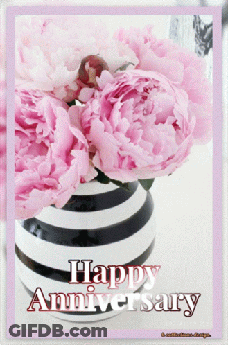 A Black And White Striped Vase With Pink Flowers And The Words Happy Anniversary GIF