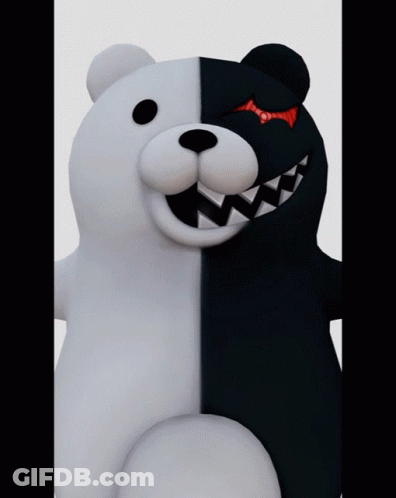 A Black And White Teddy Bear With Sharp Teeth GIF