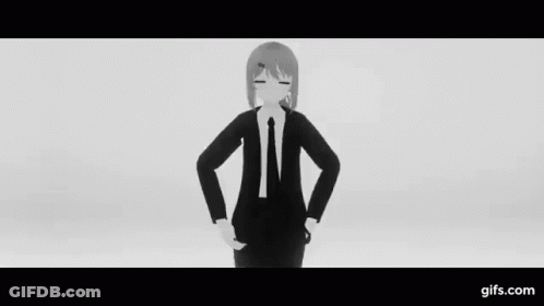 A Black And White Video Of A Girl In A Suit And Tie . GIF