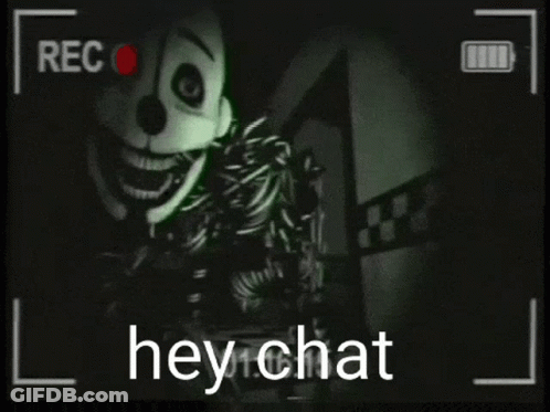A Black And White Video Of A Stuffed Animal With The Words Hey Chat On The Bottom GIF