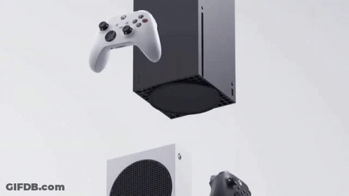 A Black And White Xbox Series S Console With Two Controllers Sitting On Top Of It . GIF