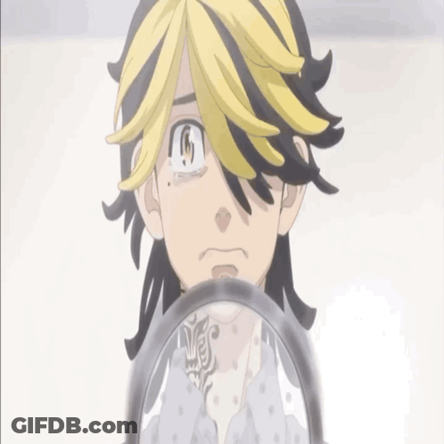 A Black And Yellow Anime Character With A Tattoo On His Chest Looks At Himself In A Mirror GIF