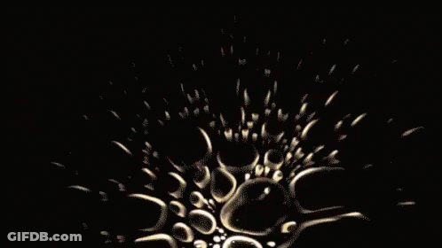 A Black Background With A Circle Of Bubbles In The Middle GIF