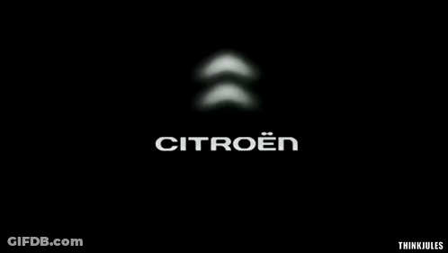 A Black Background With A Citroen Logo GIF