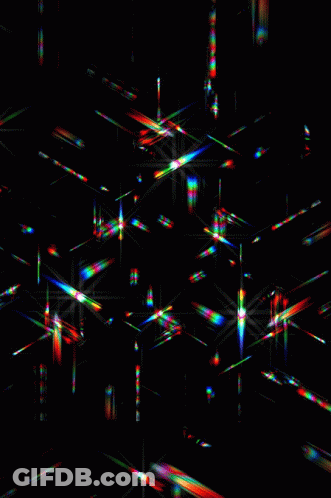 A Black Background With A Lot Of Lines That Are Glowing In The Dark GIF