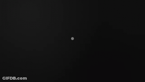 A Black Background With A Triangle And Two Dots GIF