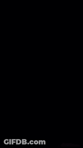 A Black Background With Blue Smoke Coming Out Of The Bottom Right Corner GIF