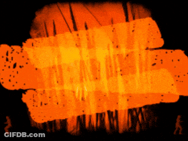 A Black Background With Orange Spots And A Silhouette Of A Person In The Foreground GIF