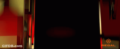 A Black Background With Red Lines And The Word Regal On The Bottom GIF
