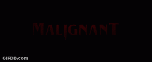 A Black Background With The Words Malignant In Red Letters GIF