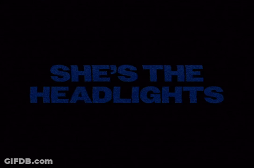A Black Background With The Words She 'S The Headlights In Blue GIF